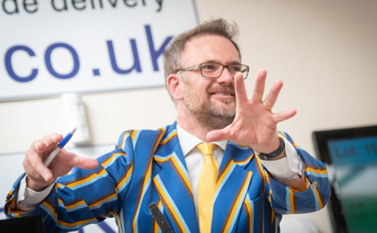 Auctioneer Charles Hanson