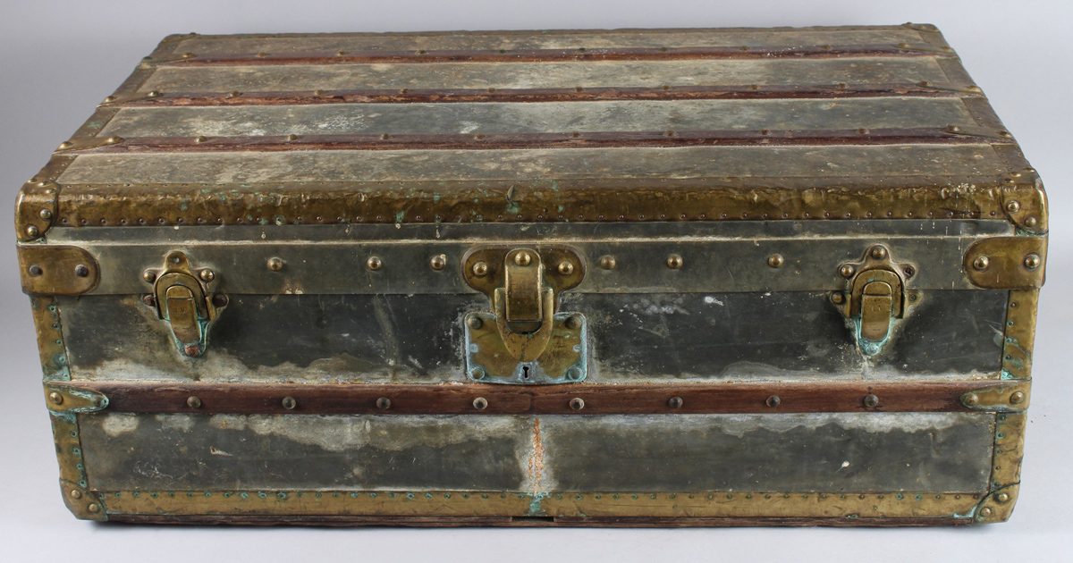 A zinc covered Louis Vuitton trunk