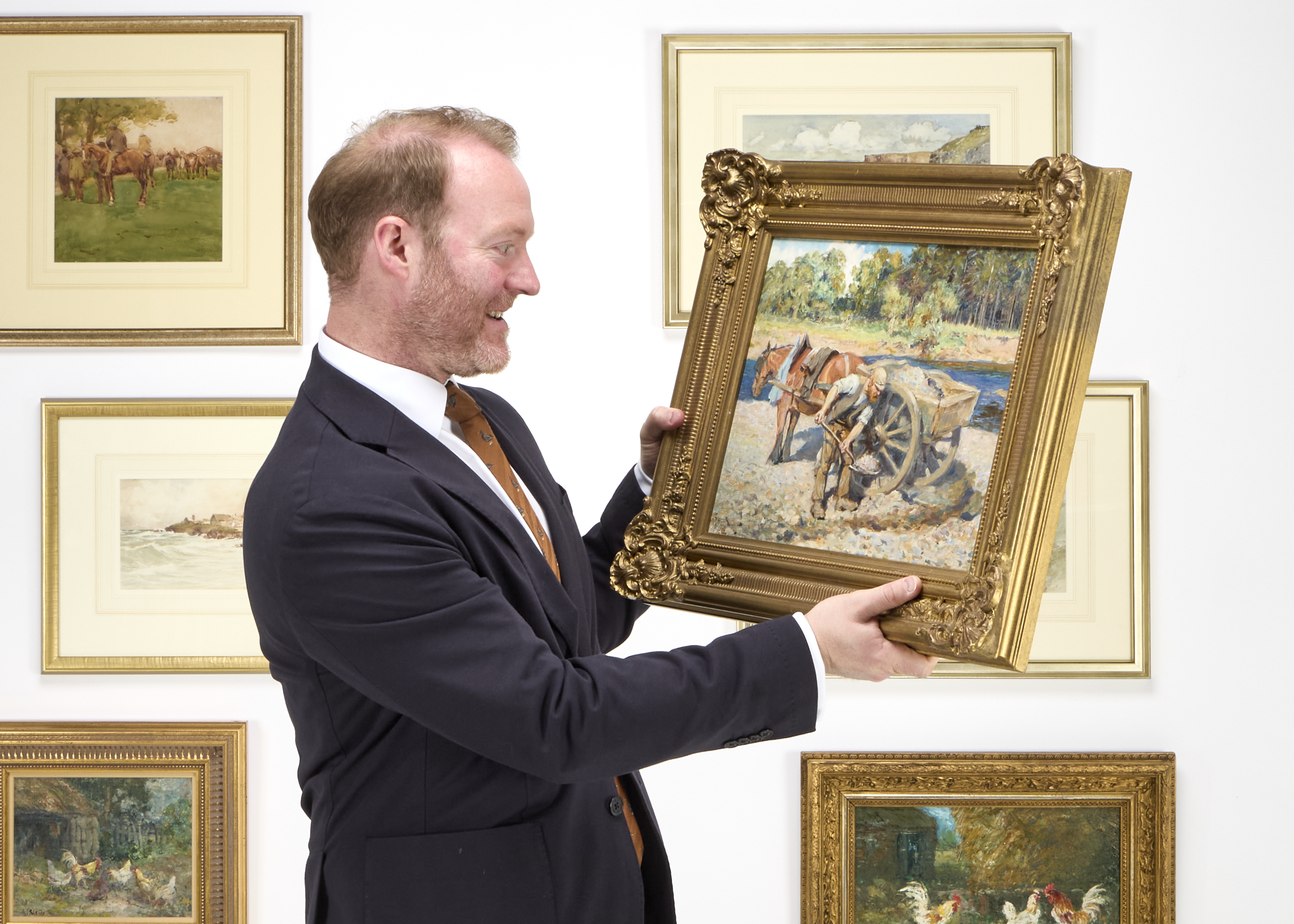 Auctioneer David Elstob Holding Collecting Gravel By Ralph Staithes