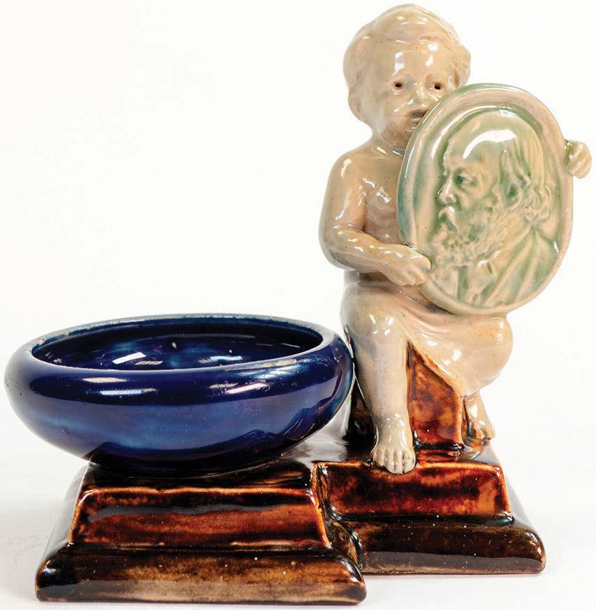 Doulton stoneware figural salt by George Tinworth
