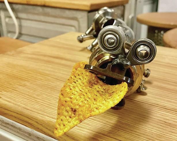 A decorative creature made from scrap metal