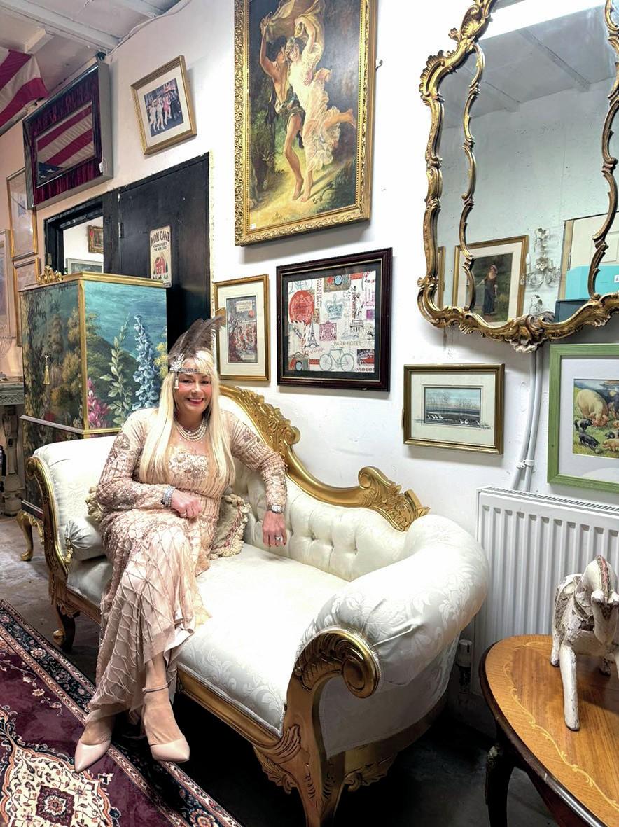 A dealer in their antiques shop