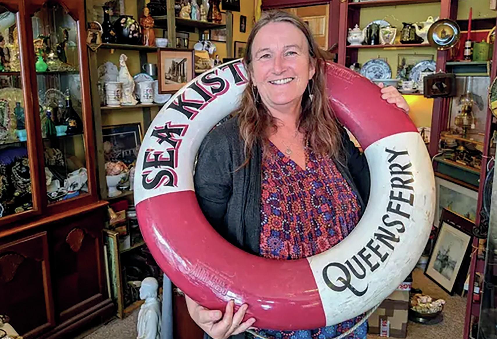 Dealer Jenni Meldrum in her antiques shop