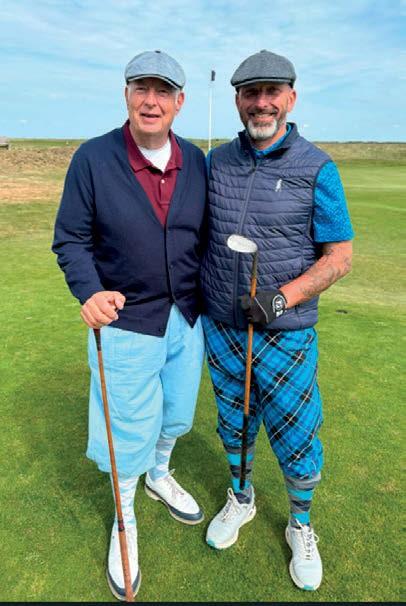 Simon Berti and Kerry Hill, wearing notable golfing apparel