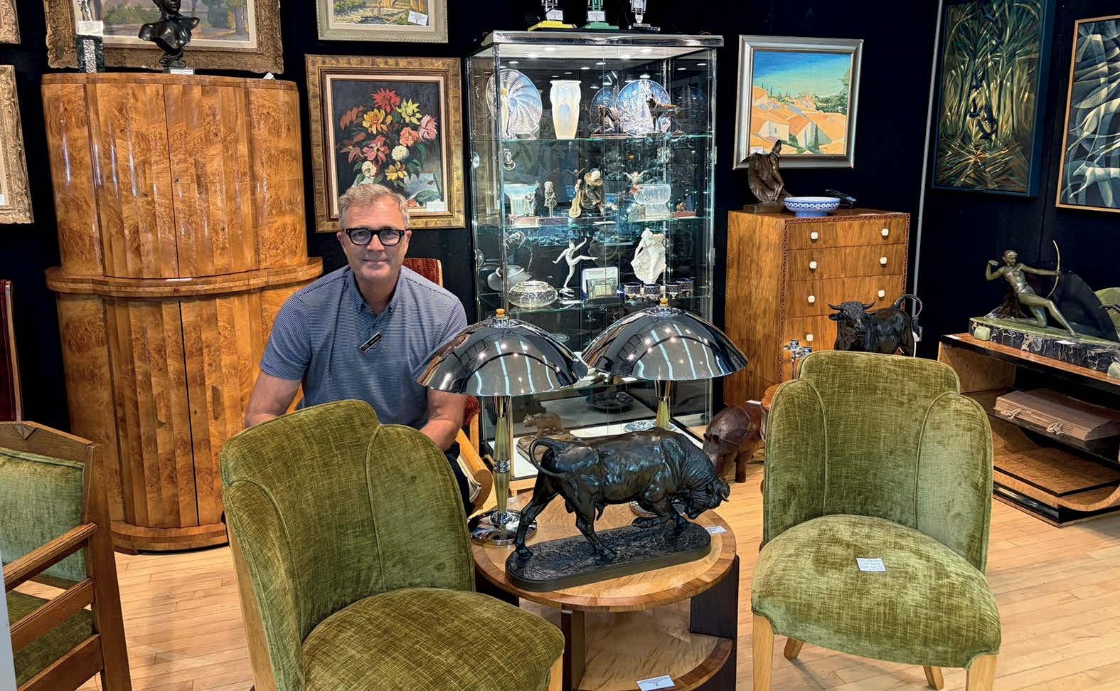 Dealer Jeroen Markies in his stand at the fair