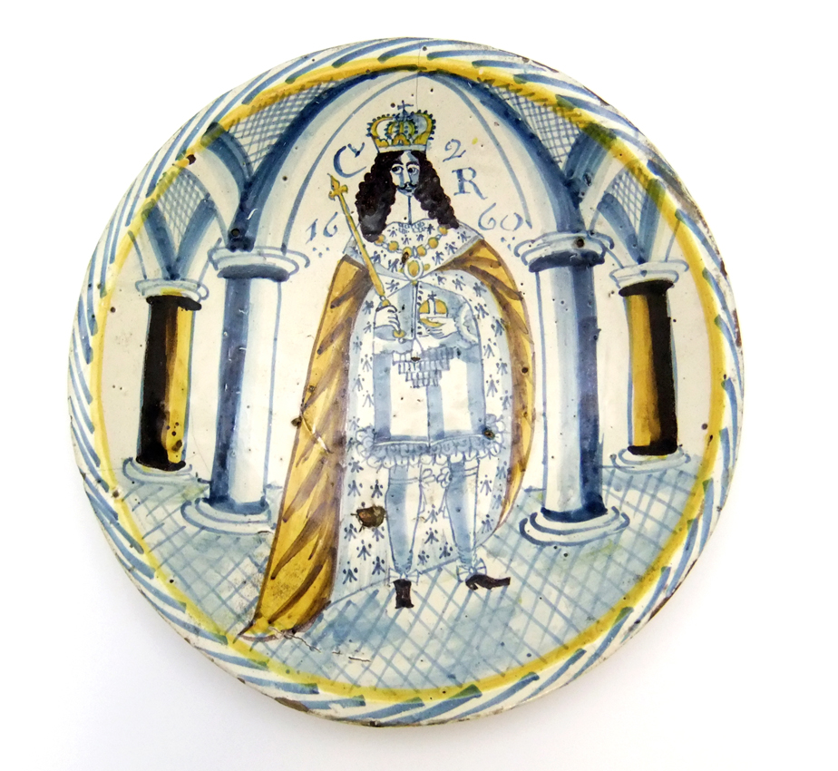 17th century Delftware charger bearing a portrait of Charles II