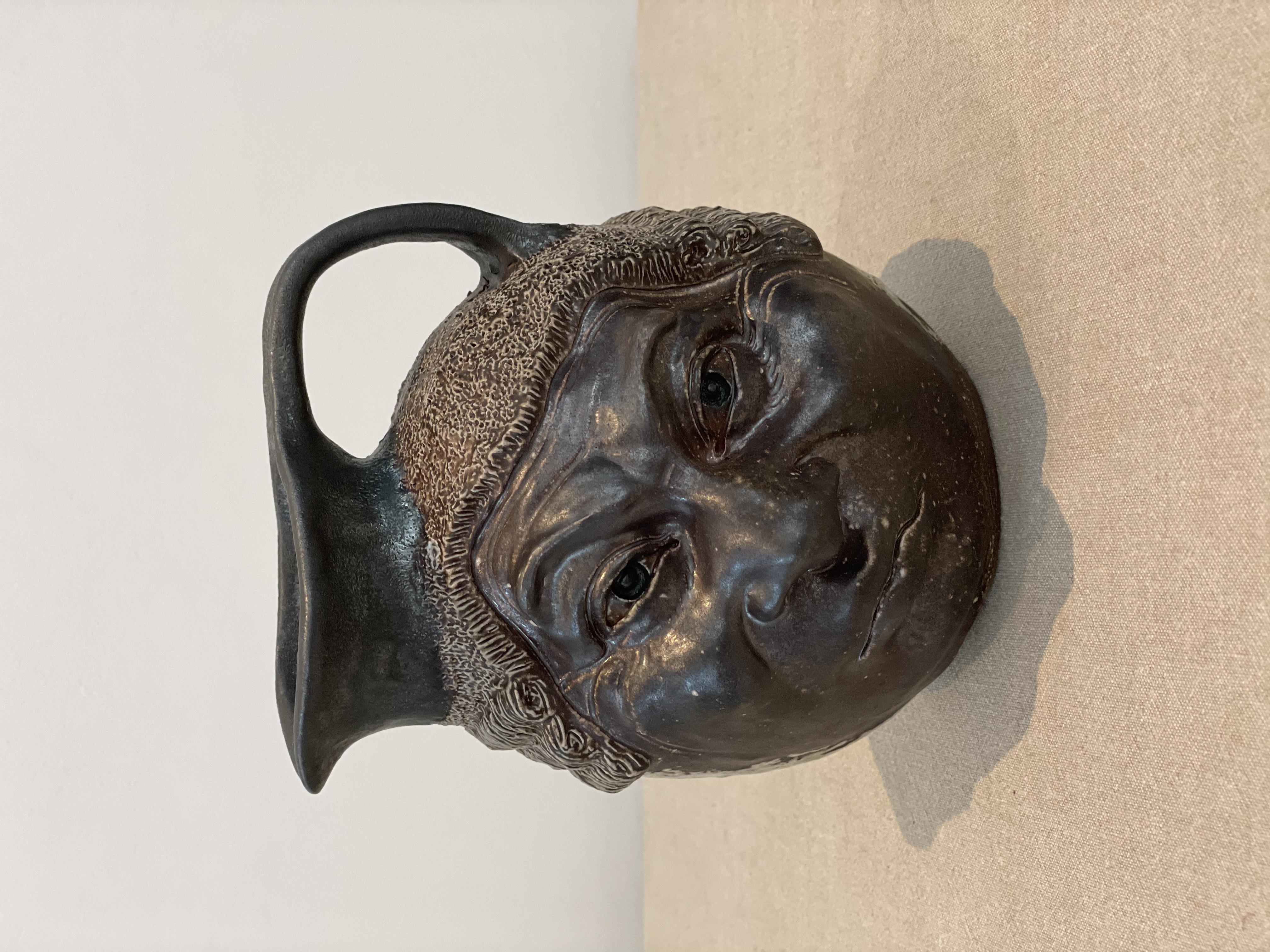 Martinware barrister face jug