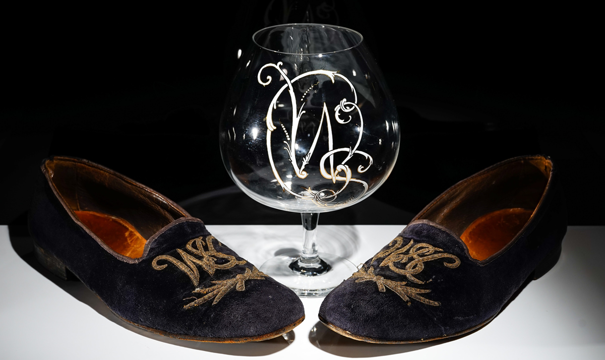 Evening slippers and a brandy balloon