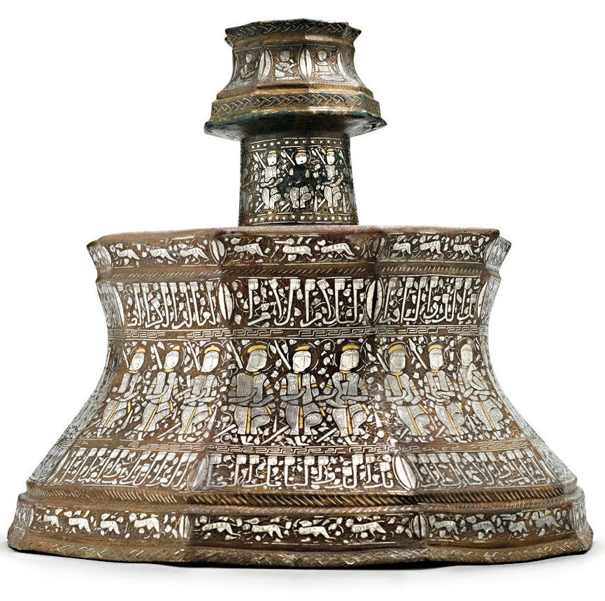 Ilkhanid gold and silver-inlaid brass candlestick