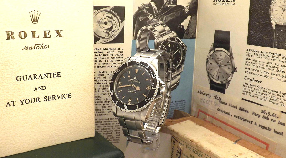 The Rolex Submariner came with an Explorer 3-6-9 gloss dial and its box and booklet.