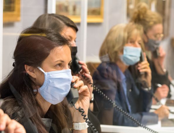 Mask-wearing in auction houses