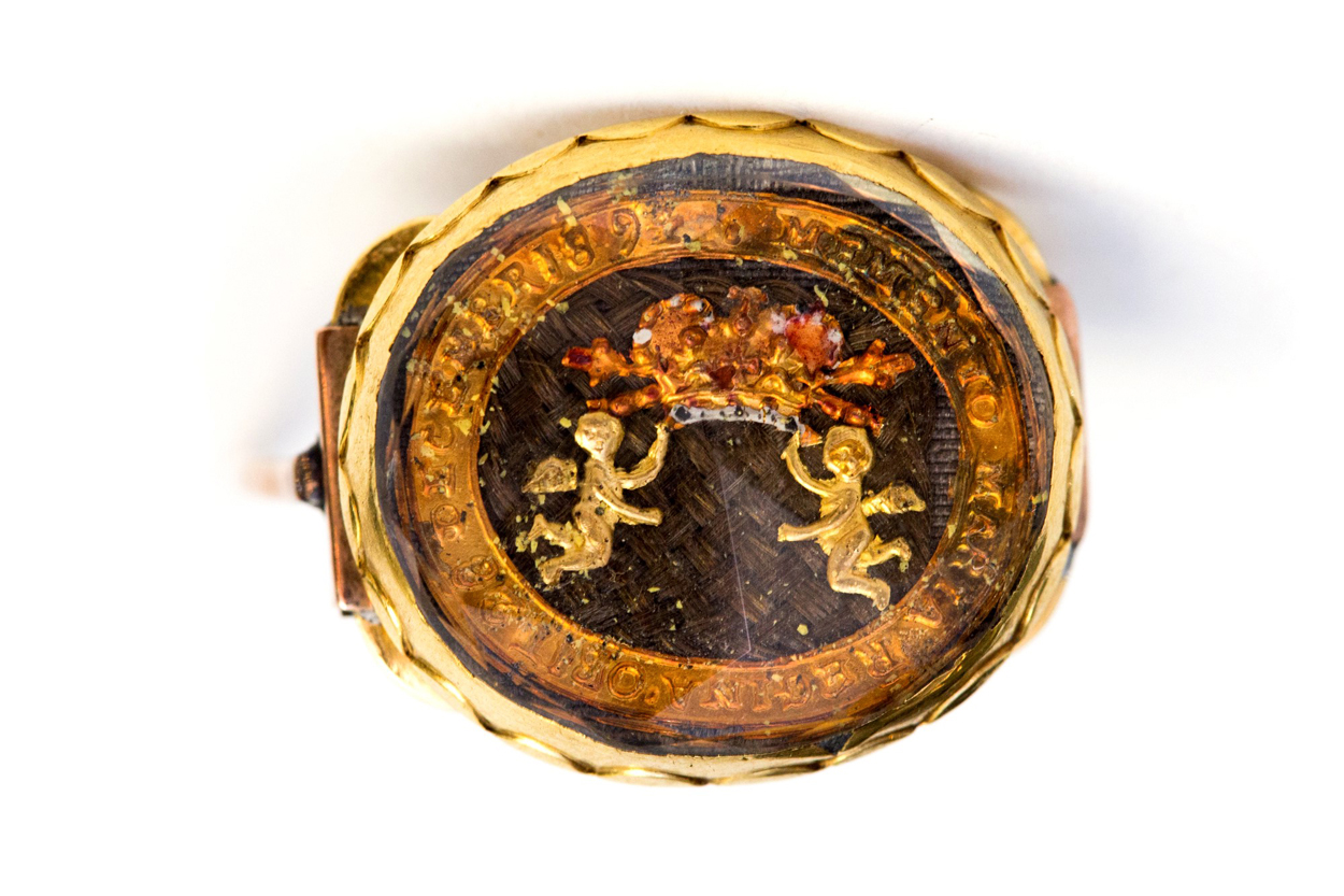 Memento mori rock crystal slide from 1694